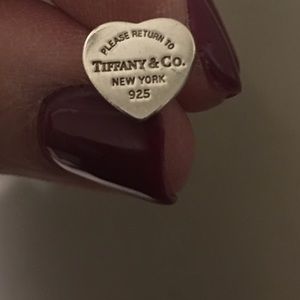 Tiffany & Co. heart shaped stud earrings.